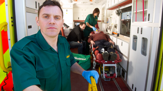 A person being treated in an ambulance.